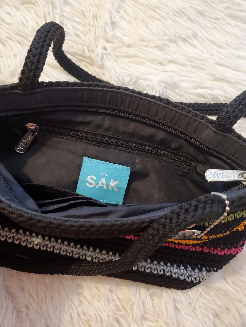 The Sak Black Crochet Shoulder Bag with Orange, Purple, Green & Blue Stripes